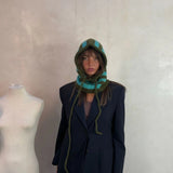 Cagoule vert polaire.